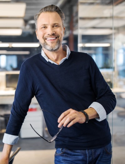 smiling man in office