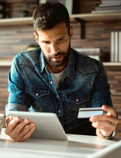 ipayment creditcard young man ipad